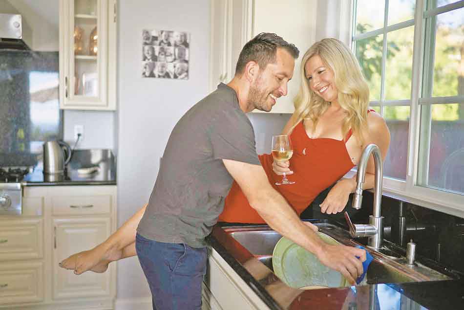 a mistress watching while husband washes up