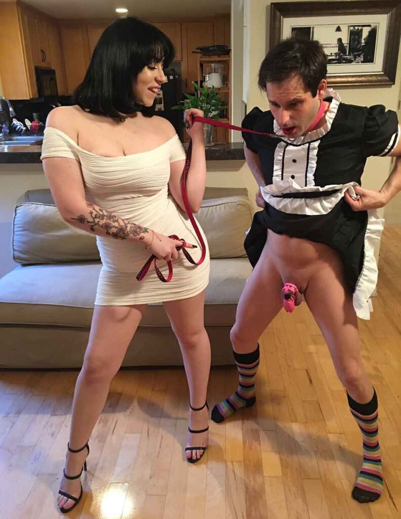 a mistress with a sissy maid on a leash