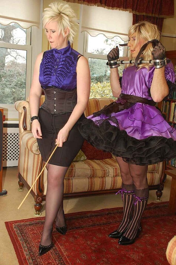 a mistress watches her sissy maid on a task