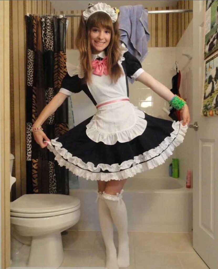 a sissy maid does a curtsey